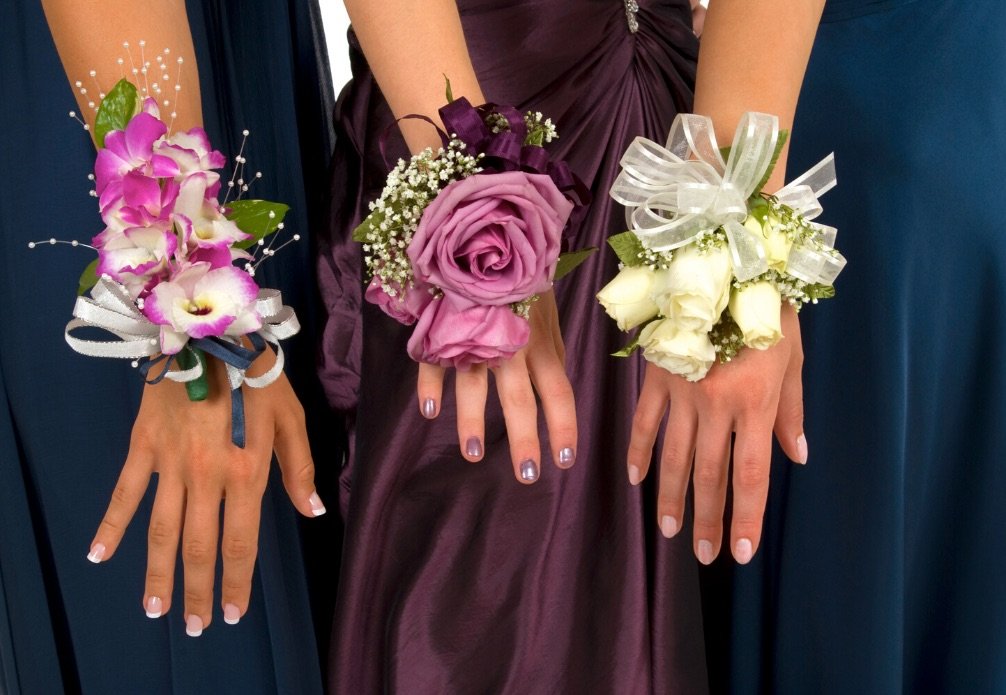 Students arriving at a school formal in a limousine